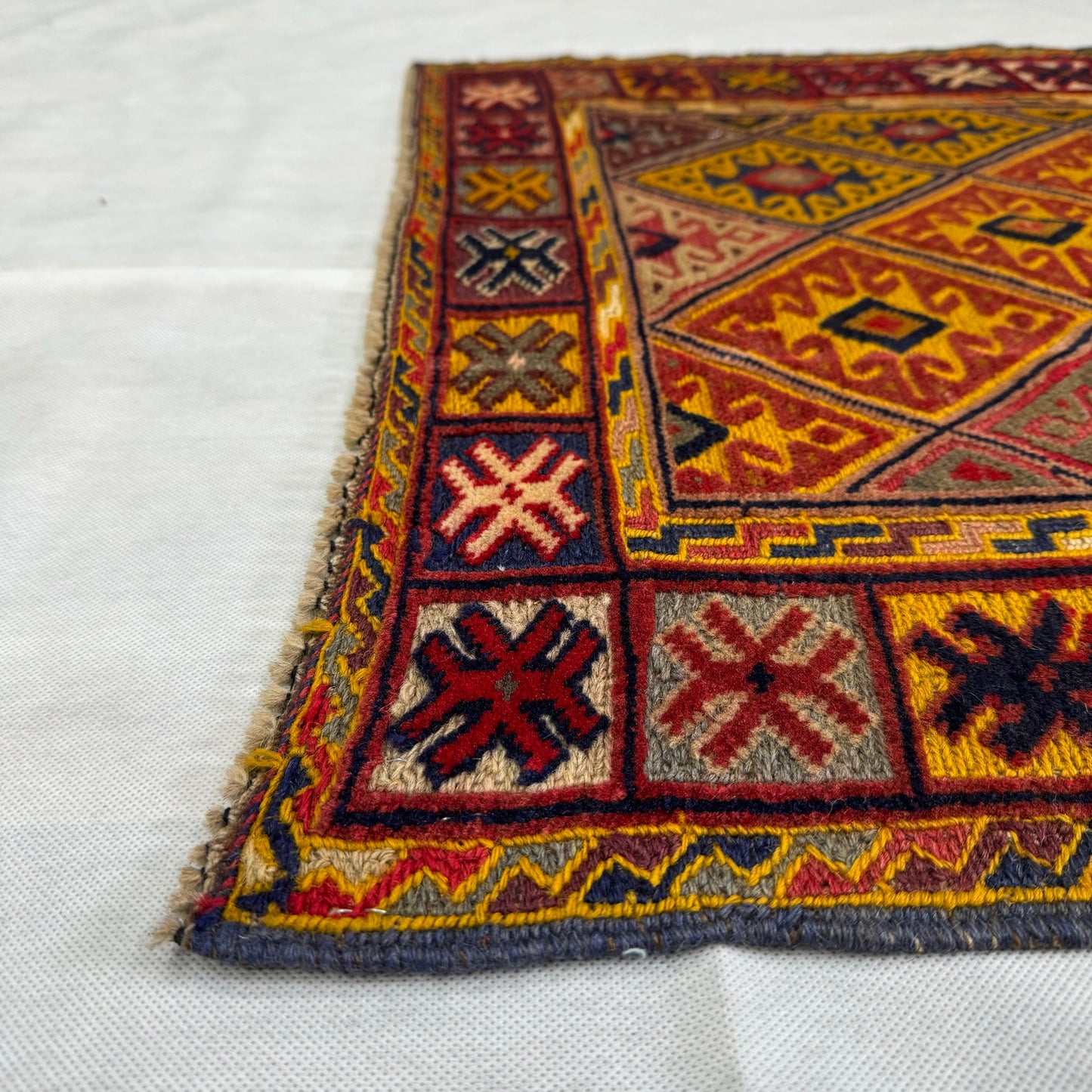 Handmade Afghan Wool Rug - 2.5ft x 5ft | Vibrant Red, Yellow, and Blue Geometric Carpet