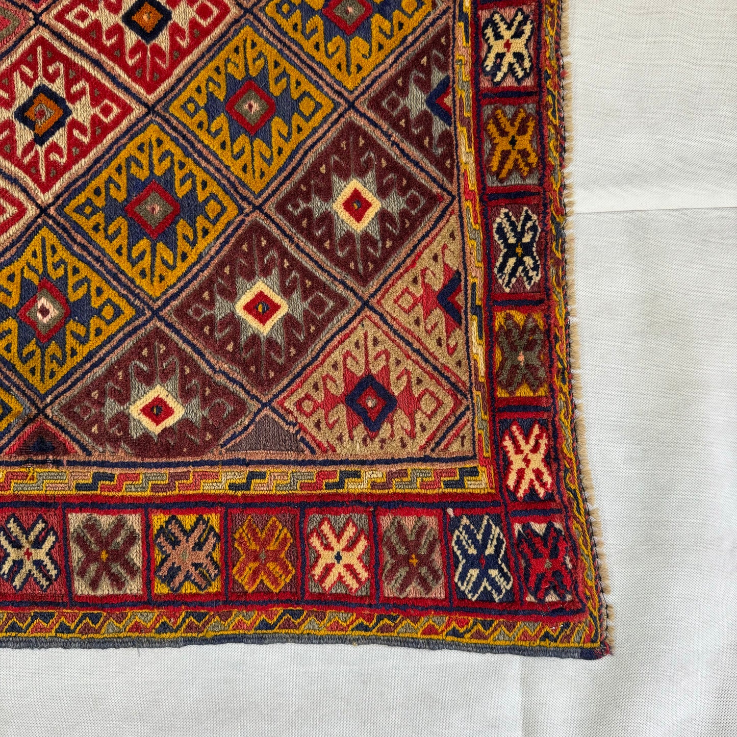 Handmade Afghan Wool Rug - 2.5ft x 5ft | Vibrant Red, Yellow, and Blue Geometric Carpet