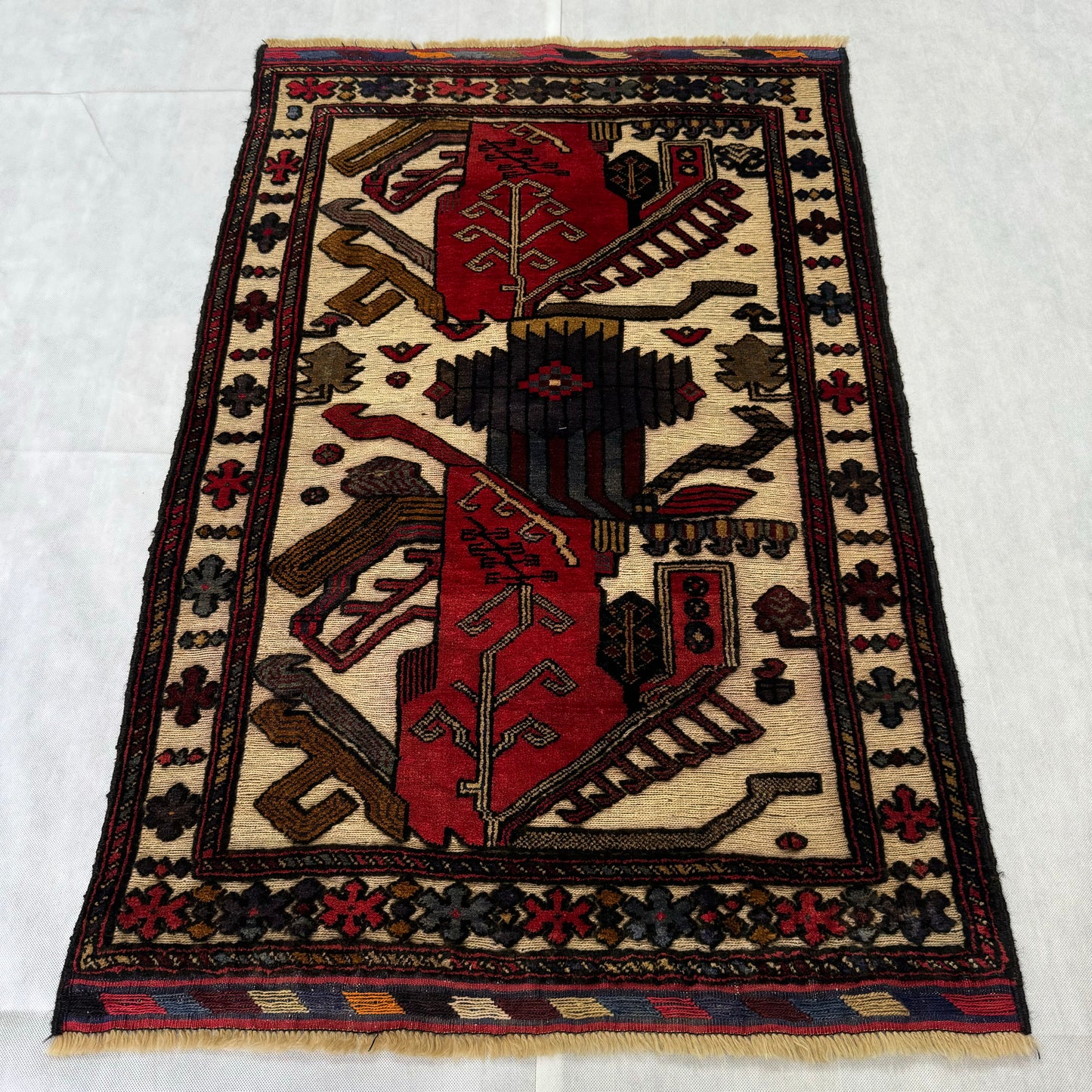 Handmade Afghan Wool Rug with Geometric Patterns (3ft x 5ft) - Red, Blue, Brown, and Beige