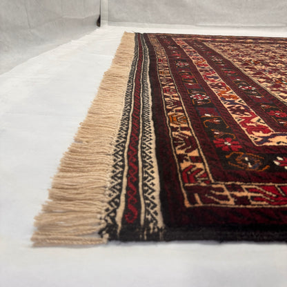 Handmade Afghan Wool Rug - 7 ft x 9 ft | Baluchi Vintage Design | Luxurious, Durable, Eco-Friendly